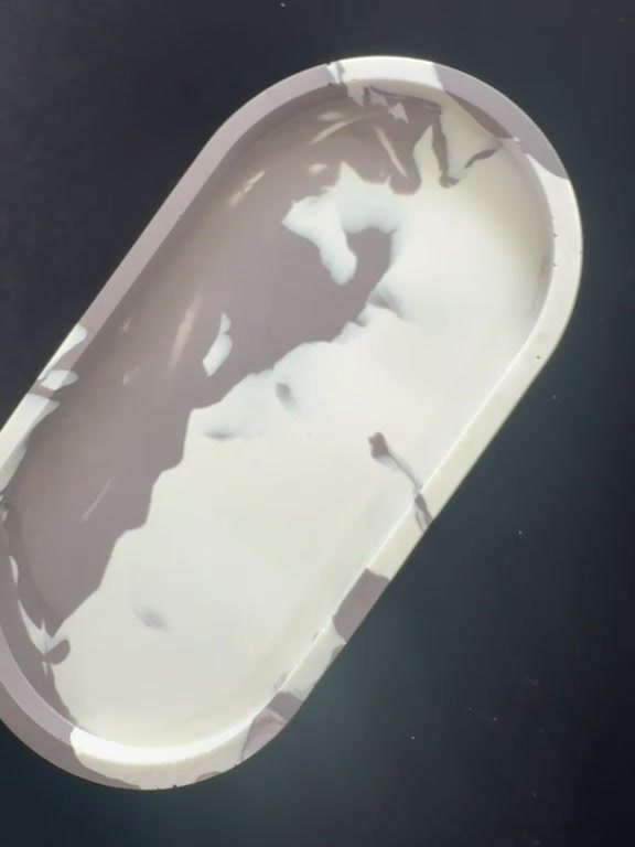Marbled tray on a dark surface